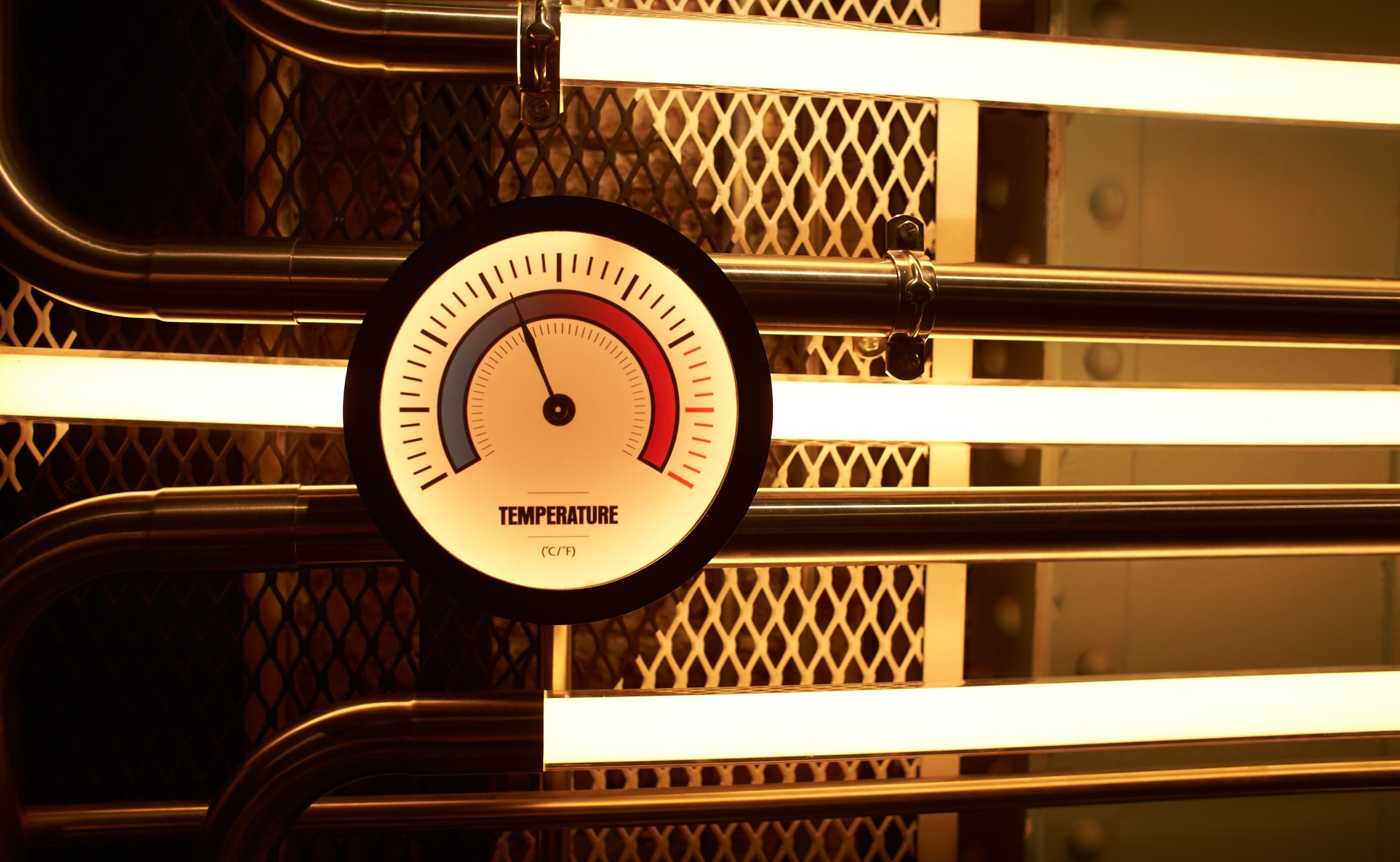 Industrial concept. Equipment of the Boiler House, Valves, Tubes, Pressure Gauges, Thermometer. Close up of Manometer, Pipe, Flow Meter, Water Pumps and Valves of Heating System in a boiler room.